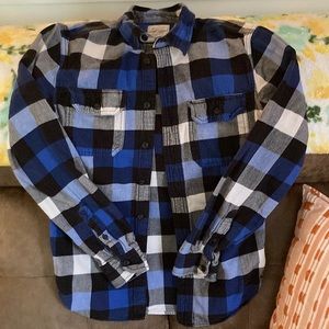 Plaid button down flannel.